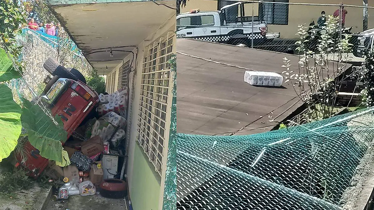 Camioneta cae en escuela de Xalapa